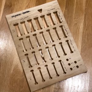 Plywood Thickness Tester - a single panel with cut outs for sizing plywood